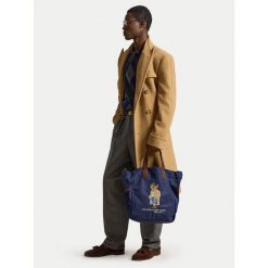 Torebka Polo Ralph Lauren. Niebieskie torebki klasyczne Polo Ralph Lauren, bez wzorów, klasyczne, bez dodatków. Za 919.99 zł.