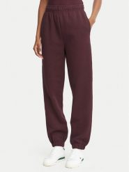 Lacoste Spodnie dresowe XF5244 Bordowy Regular Fit. Czerwone spodnie dresowe Lacoste, bez wzorów, z bawełny. Za 624.99 zł.