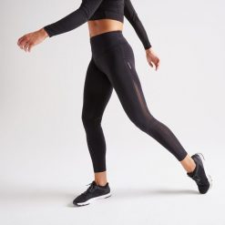 Legginsy fitness damskie Domyos. Fioletowe legginsy DOMYOS, bez wzorów, z bawełny, sportowe. W wyprzedaży za 69.99 zł.