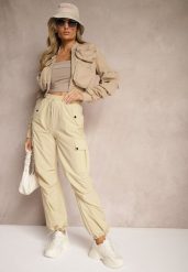 Beżowe Spodnie Cargo High Waist z Ozdobnymi Kieszeniami Leriora. Brązowe jeansy Renee, bez wzorów, z jeansu, eleganckie, z podwyższonym stanem. W wyprzedaży za 35.99 zł.