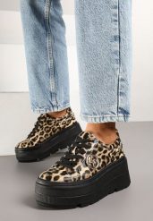 Panterkowe Sneakersy Vices na Grubej Podeszwie z Metaliczną Ozdobą Tatorelis. Buty sportowe lifestyle Born2be, z aplikacjami, z jeansu, eleganckie, bez zapięcia. W wyprzedaży za 118.99 zł.