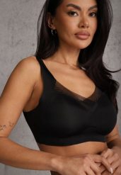 Czarny Sportowy Biustonosz z Usztywnieniem Ozdobiony Siateczkową Wstawką Edalissa. Czarne biustonosze sportowe Renee, bez wzorów, na jogę i pilates. Za 24.99 zł.