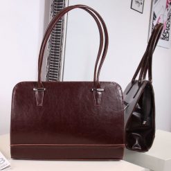 Torebka skórzana kuferek DAN-A T302 koniak. Torebki klasyczne DAN-A, bez wzorów, ze skóry, eleganckie, bez dodatków. Za 349.99 zł.