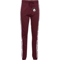 Spodnie dresowe "Myszka Miki" bonprix czerwony klonowy. Spodnie sportowe marki bonprix. Za 69.99 zł.