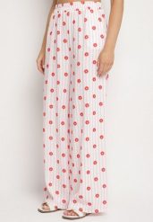 Różowe Bawełniane Spodnie o Szerokim Kroju z Gumką w Talii Ranoline. Czerwone jeansy Born2be, bez wzorów, z bawełny, eleganckie, z podwyższonym stanem. Za 119.99 zł.