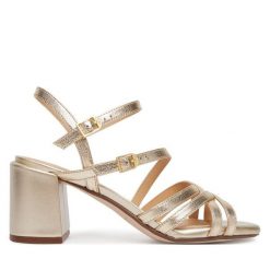 Sandały Clarks. Żółte sandały Clarks, bez wzorów, bez obcasa, na słupku, bez zapięcia. Za 389.99 zł.