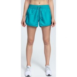 Spodenki plażowe damskie SKDT200 - morska zieleń. Szorty marki Nike. Za 49.99 zł.