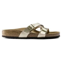BIRKENSTOCK Yao Balance BF Gold Klapki damskie. Żółte klapki Birkenstock, bez wzorów, ze skóry, eleganckie, bez obcasa, bez zapięcia. Za 299.99 zł.