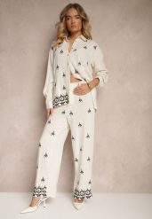 Biało-Czarne Spodnie z Wiskozą i Lnem High Waist o Szerokim Kroju z Haftami Olerina. Białe jeansy Renee, na lato, l, bez wzorów, z jeansu, boho, z podwyższonym stanem. W wyprzedaży za 90.99 zł.