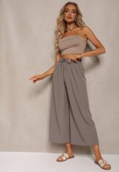 Szare Spodnie High Waist z Szerokimi Nogawkami z Wiskozą Wykończone Gumką w Talii Crisantas. Szare jeansy Renee, l, bez wzorów, z jeansu, biznesowe, z podwyższonym stanem. W wyprzedaży za 31.99 zł.