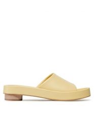 Gino Rossi Klapki 22SS17 Żółty. Żółte klapki Gino Rossi, bez wzorów, ze skóry, bez obcasa, bez zapięcia. Za 299.99 zł.