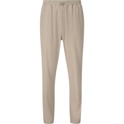 Damskie spodnie dresowe Athlecia Amisa. Brązowe spodnie dresowe Athlecia, bez wzorów, z dresówki. Za 243.50 zł.