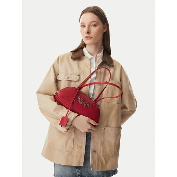 Torebka Tommy Jeans. Brązowe torebki klasyczne Tommy Jeans, bez wzorów, z jeansu, klasyczne, bez dodatków. Za 363.99 zł.