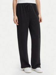 ONLY Spodnie materiałowe Maya 15369156 Czarny Loose Fit. Czarne spodnie materiałowe ONLY, bez wzorów, z materiału. Za 169.99 zł.