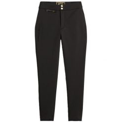 Damskie legginsy Superdry Luxe. Czarne legginsy Superdry, bez wzorów, eleganckie. W wyprzedaży za 778.65 zł.