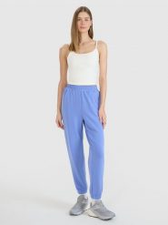 4F Spodnie dresowe joggery z modalem damskie - niebieskie XL. Niebieskie spodnie dresowe 4f, bez wzorów, z dresówki, sportowe. Za 159.99 zł.