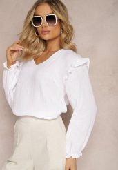 Biała Bawełniana Bluzka z Trójkątnym Dekoltem i Ozdobną Falbanką Redsta. Białe bluzki Renee, xl, bez wzorów, z bawełny, eleganckie, bez kołnierzyka, bez ramiączek. W wyprzedaży za 39.99 zł.