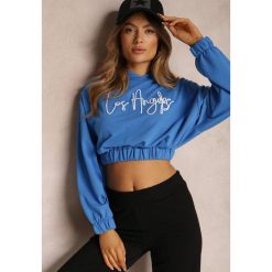 Niebieska Bluza Krótka z Kapturem Zulikha. Niebieskie bluzy Renee, l, bez wzorów, z dzianiny, casualowe, bez ramiączek, z kapturem. W wyprzedaży za 83.99 zł.