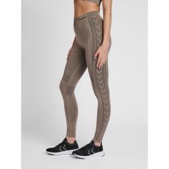Damskie legginsy mid-rise Hummel Shaping. Szare legginsy Hummel, bez wzorów, z materiału, sportowe. Za 125.50 zł.