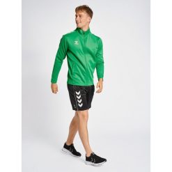 Kurtka z dresu Hummel Core XK. Czarne kurtki Hummel, xl, bez wzorów, z dresówki, eleganckie, bez kaptura. Za 105.50 zł.