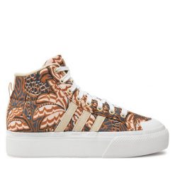 Trampki adidas. Brązowe trampki adidas, bez wzorów, bez zapięcia. Za 239.99 zł.