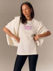 4F T-shirt loose z nadrukiem damski - biały L. Brązowe t-shirty 4f, l, bez wzorów, z materiału, eleganckie, bez kołnierzyka, bez ramiączek. Za 79.99 zł.