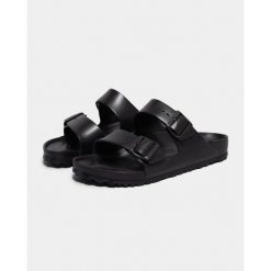 Klapki damskie Birkenstock Arizona W Eva. Czarne klapki Birkenstock, bez wzorów, z materiału, bez obcasa, bez zapięcia. Za 189.00 zł.