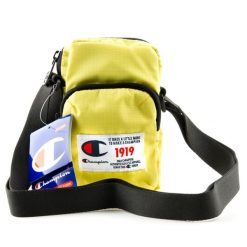 Saszetka turystyczna Champion Mini Shoulder na ramię. Żółte nerki i saszetki Champion, bez wzorów, z poliesteru, bez dodatków. W wyprzedaży za 64.00 zł.