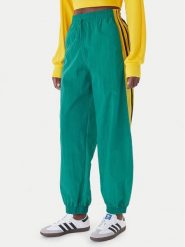 Adidas Spodnie dresowe Sport Santiago KD2971 Zielony Loose Fit. Zielone spodnie dresowe adidas, bez wzorów, z dresówki. Za 349.99 zł.