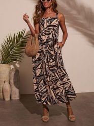 Milan Kiss Sukienka w kolorze czarno-beżowym rozmiar: M. Brązowe sukienki Milan Kiss, na imprezę, m, bez wzorów, z wiskozy, bez kołnierzyka, bez ramiączek, maxi. Za 170.47 zł.