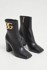 Botki damskie DOLCE & GABANA. Botki Dolce & Gabbana, bez wzorów, bez obcasa, bez zapięcia. W wyprzedaży za 4,829.25 zł.