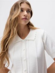 Kardigan z kołnierzem - kremowy. Białe swetry Reserved, l, bez wzorów, z dzianiny, bez ramiączek. Za 129.99 zł.