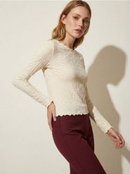 Strukturalna bluzka z długimi rękawami - żółty. Żółte bluzki Sinsay, l, bez wzorów, bez kołnierzyka, bez ramiączek. Za 29.99 zł.