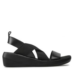 Sandały Fly London. Czarne sandały Fly London, bez wzorów, bez obcasa, na koturnie, bez zapięcia. Za 629.99 zł.