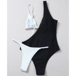 Strój kąpielowy prążkowany asymetryczny szybkoschnący Gerta. Stroje jednoczęściowe Intica, bez wzorów, z materiału. Za 149.00 zł.