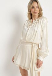Beżowa Wiskozowa Sukienka Ozdobiona Wiązaniem i Falbanką Rallio. Brązowe sukienki Born2be, na co dzień, l, z aplikacjami, z jeansu, eleganckie, bez kołnierzyka, bez ramiączek, mini, proste. W wyprzedaży za 127.49 zł.