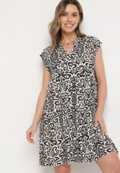Czarna Bawełniana Sukienka o Rozkloszowanym Kroju Oversize Liravina. Czarne sukienki Born2be, na co dzień, l, bez wzorów, z bawełny, eleganckie, bez kołnierzyka, bez ramiączek, midi, oversize. W wyprzedaży za 42.49 zł.