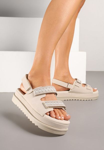 Beżowe Sandały na Niskiej Platformie z Zapięciem na Rzep Zdobione Haftem Soreze. Brązowe sandały Renee, z aplikacjami, bez obcasa, na płaskiej podeszwie, bez zapięcia. Za 109.99 zł.