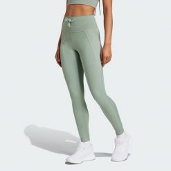 Legginsy Running Essentials. Czarne legginsy adidas, bez wzorów, z materiału, sportowe. Za 199.00 zł.