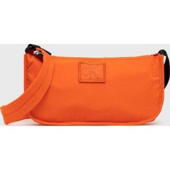 Calvin Klein Jeans saszetka kolor pomarańczowy. Brązowe nerki i saszetki Calvin Klein Jeans, bez wzorów, z jeansu, bez dodatków. W wyprzedaży za 199.99 zł.