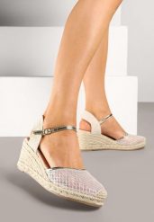 Złote Sandały Espadryle na Koturnie z Plecionki z Siateczką Meranisea. Żółte sandały Born2be, bez wzorów, z jeansu, klasyczne, bez obcasa, na koturnie, bez zapięcia. Za 99.99 zł.