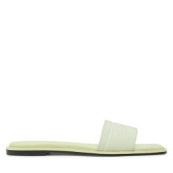 Klapki Calvin Klein. Zielone klapki Calvin Klein, bez wzorów, bez obcasa, bez zapięcia. Za 249.99 zł.
