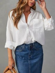 Milan Kiss Bluzka w kolorze białym rozmiar: M. Białe bluzki Milan Kiss, m, bez wzorów, prążkowane, bez kołnierzyka, bez ramiączek. Za 139.87 zł.