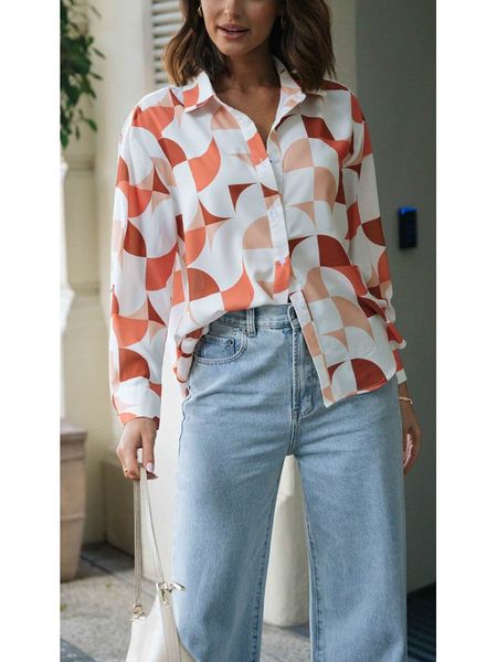 Milan Kiss Bluzka w kolorze biało-pomarańczowym rozmiar: S. Białe bluzki Milan Kiss, s, bez wzorów, z wiskozy, bez kołnierzyka, bez ramiączek. Za 148.26 zł.