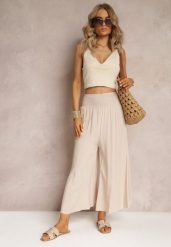 Jasnobeżowe Szerokie Spodnie High Waist o Długości 7/8 Rathi. Brązowe jeansy Renee, m, bez wzorów, z jeansu, z podwyższonym stanem. W wyprzedaży za 39.99 zł.