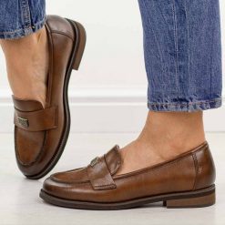 Brązowe skórzane mokasyny damskie Potocki 19465. Brązowe mokasyny POTOCKI, z aplikacjami, z jeansu, z okrągłym noskiem. Za 229.00 zł.