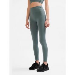 Legginsy sportowe dla kobiet Hummel. Szare legginsy Hummel, bez wzorów, z materiału, sportowe. Za 130.50 zł.