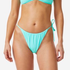 Dół kostiumu kąpielowego damski Roxy Tie Side Cheeky. Niebieskie bikini Roxy, bez wzorów, z tkaniny, sportowe. Za 69.99 zł.