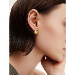 Kolczyki Guess. Żółte kolczyki Guess, złote. Za 129.99 zł.