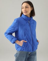 Niebieska kurtka puchowa. Niebieskie kurtki Unisono, s, bez wzorów, z puchu, bez kaptura. Za 399.00 zł.